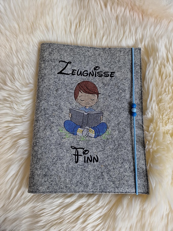 Zeugnismappe Junge Buch lesen mit Namen W82
